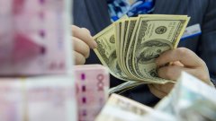 前6月中国外汇市场累计成交15087万亿元人民币